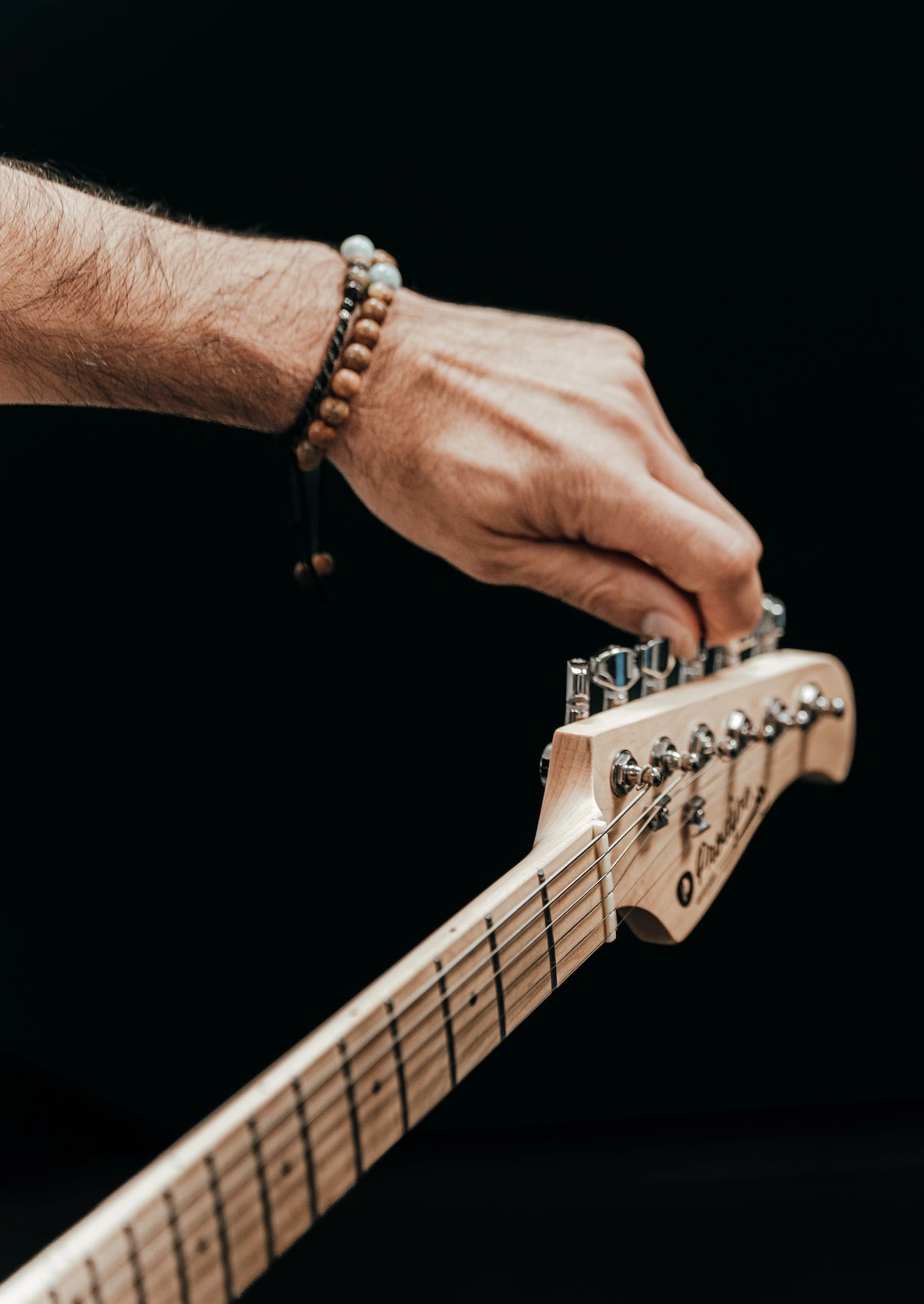 Main guitare Fender tête manche